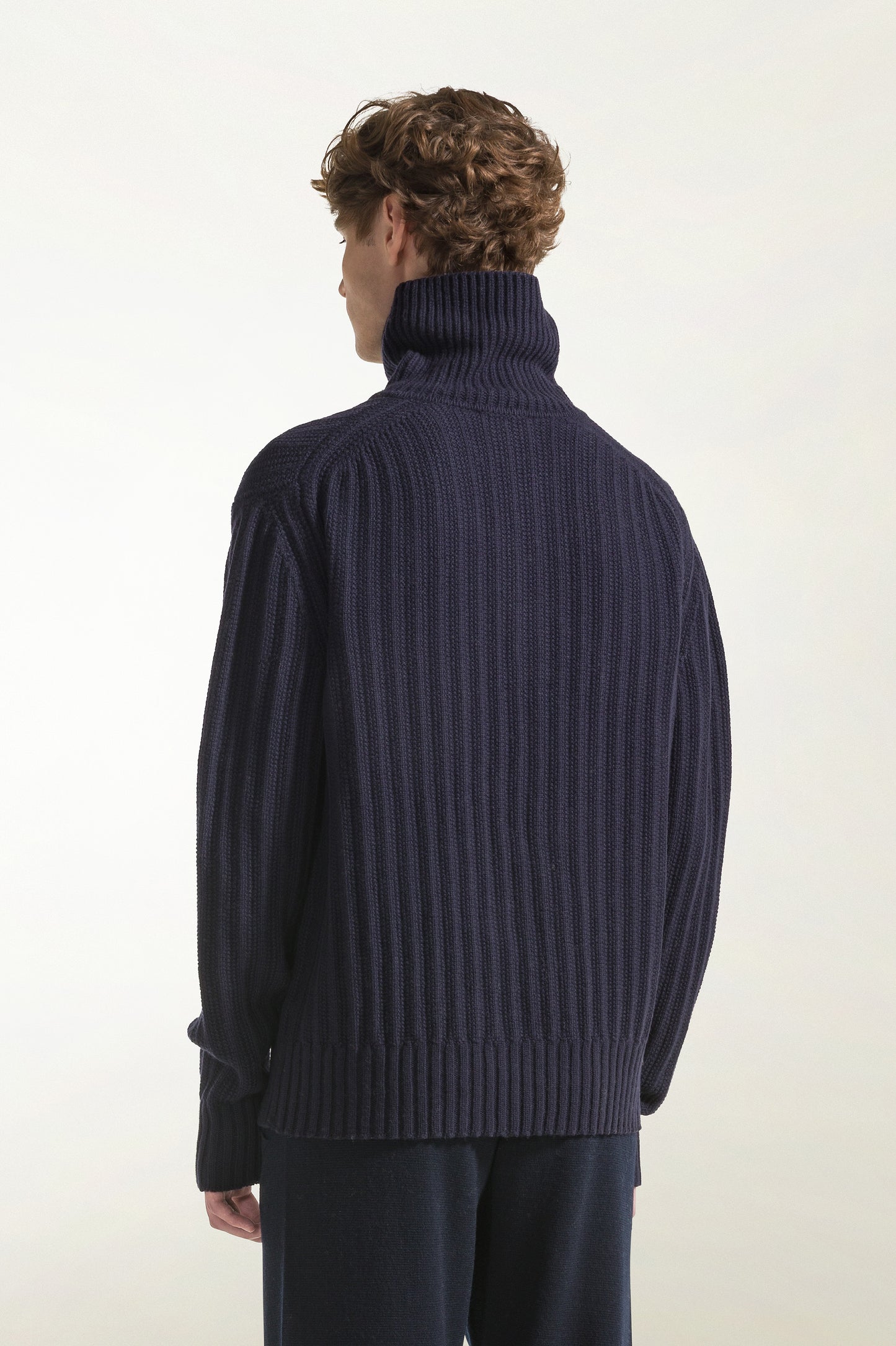 Blue turtleneck with buttons