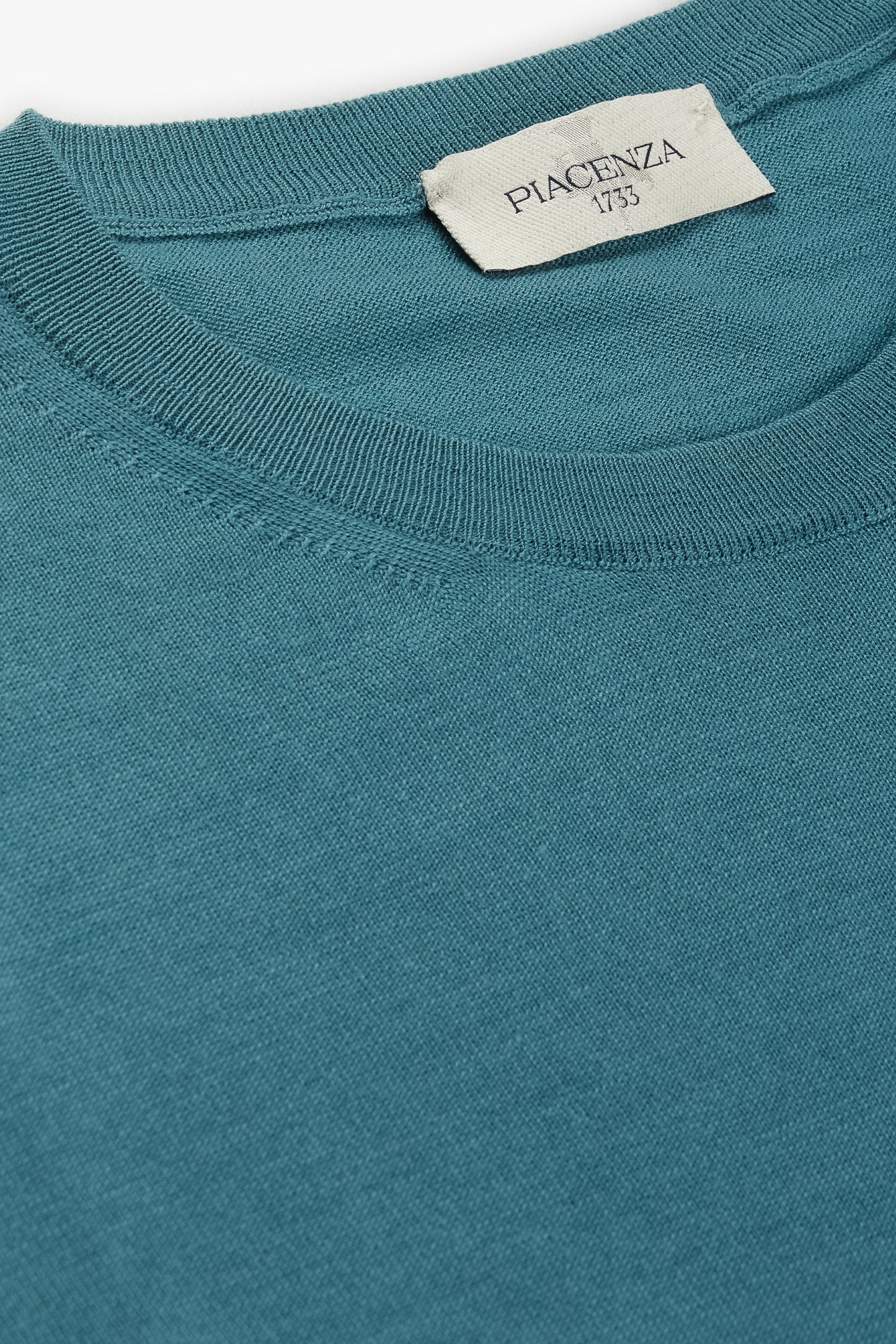 Girocollo leggero in lana merino colore verde petrolio