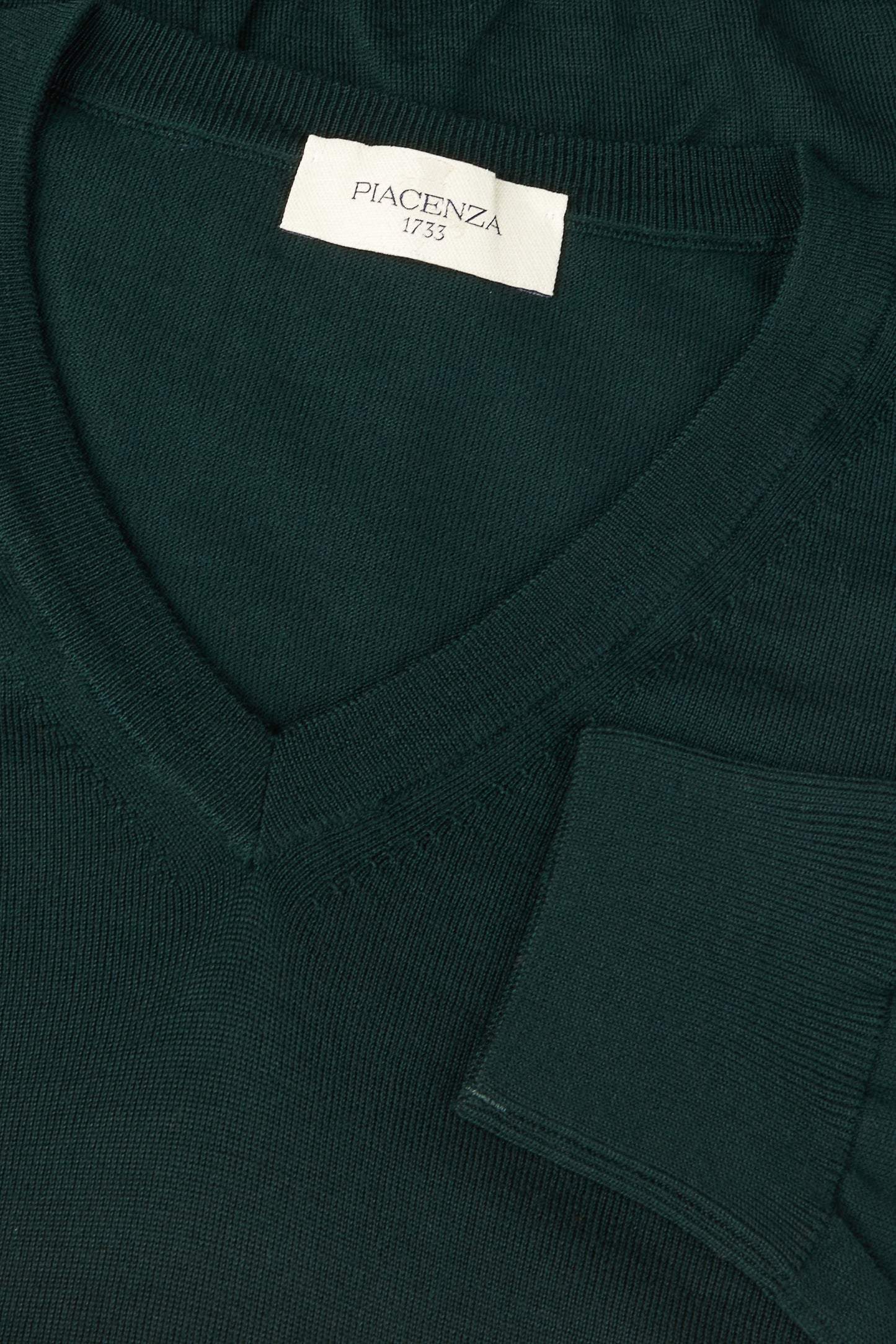 Lightweight V-neck sweater in dark green merino wool