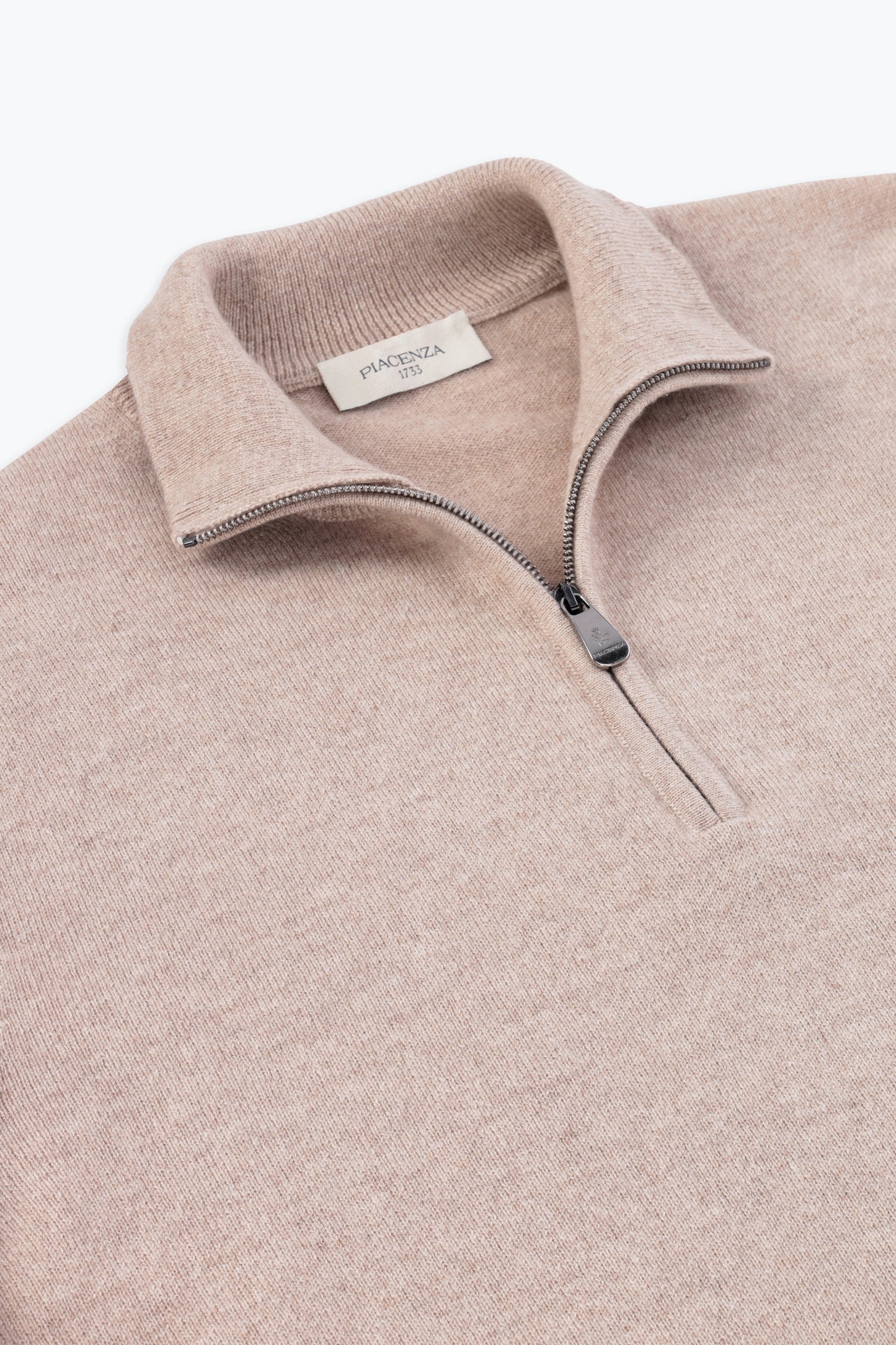 NATURAL ZIP TURTLENECK