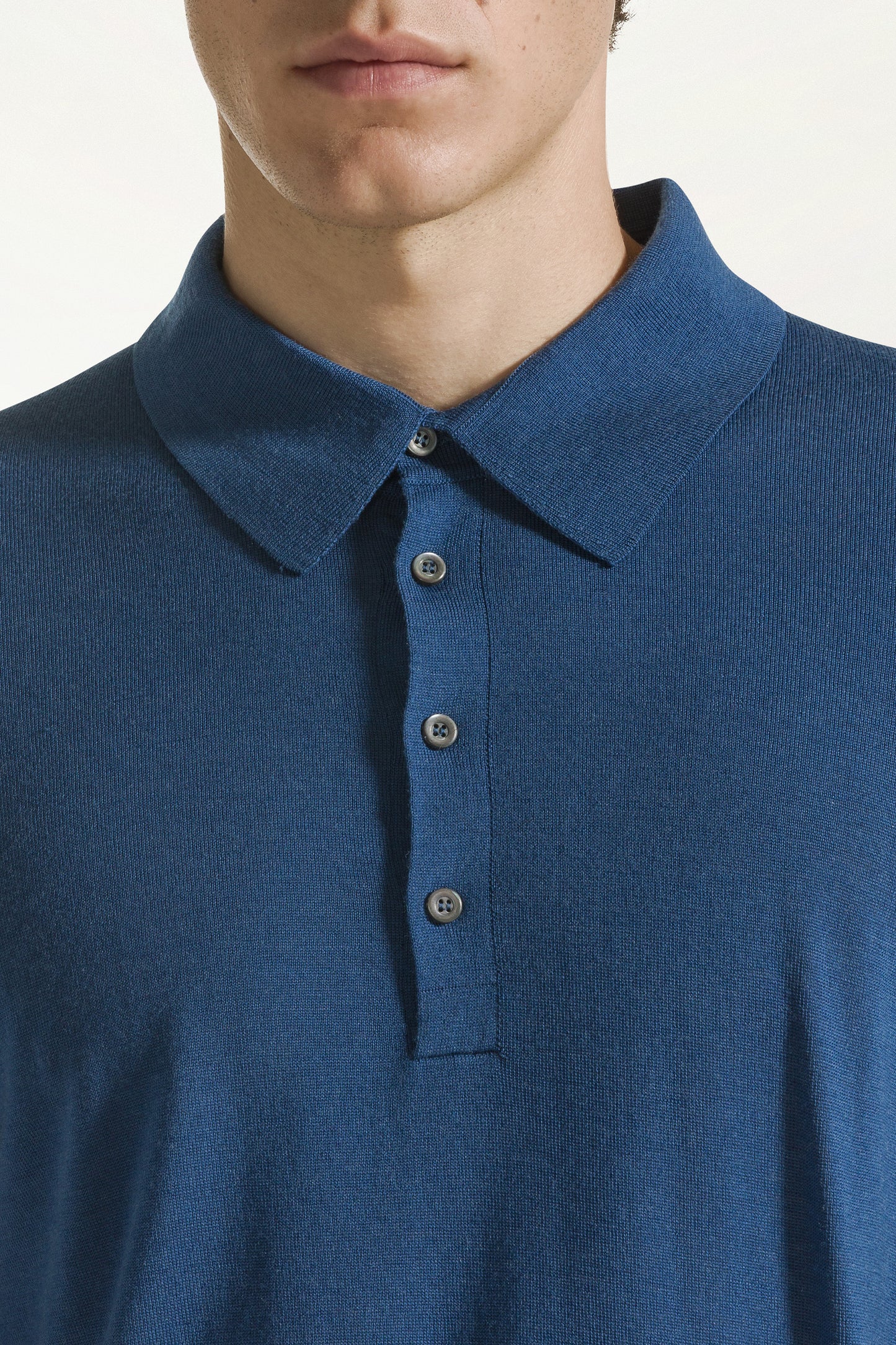 Lightweight merino wool polo shirt in jeans blue