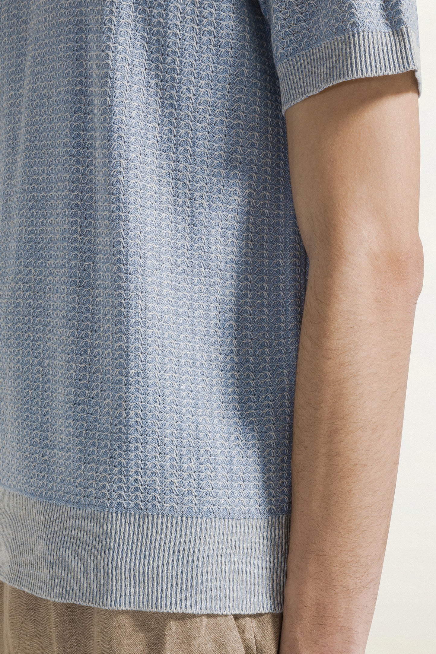 Light blue crew neck with short sleeves