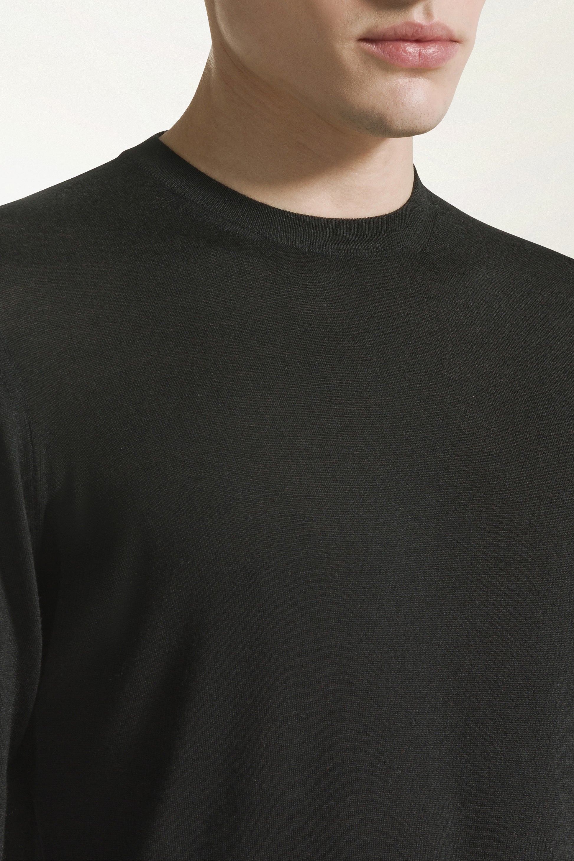 Lightweight crewneck in black merino wool | PIACENZA 1733