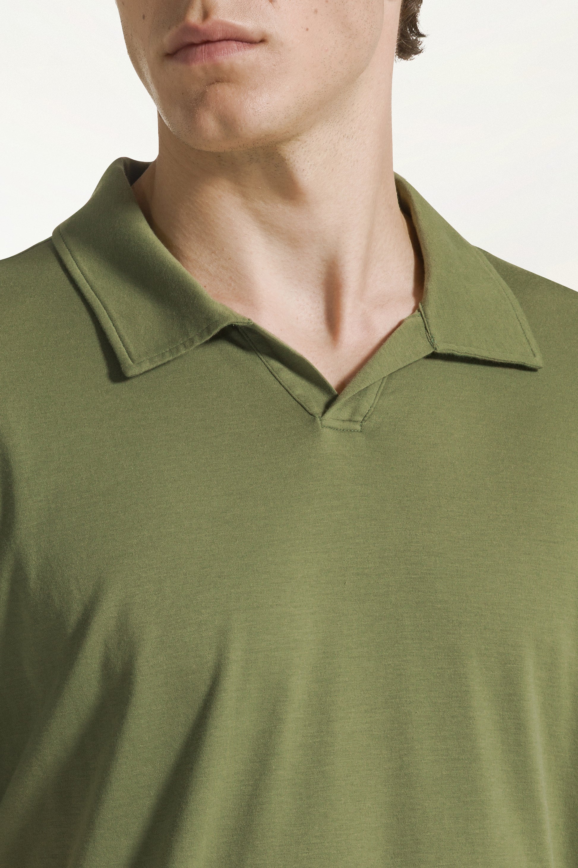 Green short-sleeved buttonless polo shirt | PIACENZA 1733