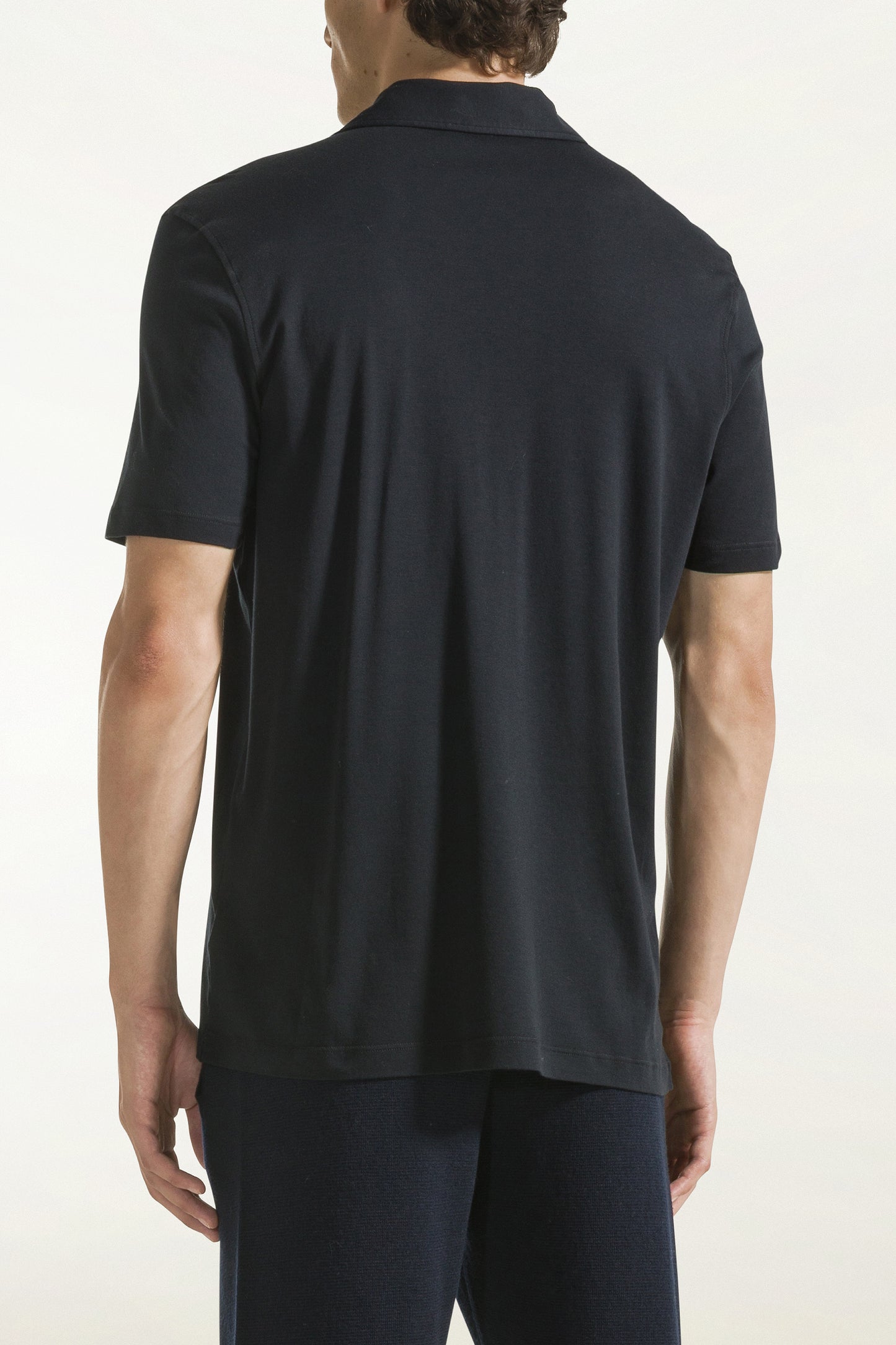 Black short-sleeved polo shirt with buttons